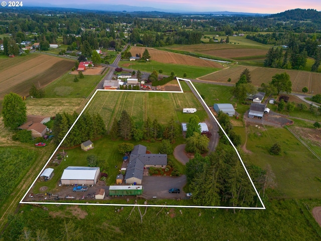 aerial view at dusk with a rural view