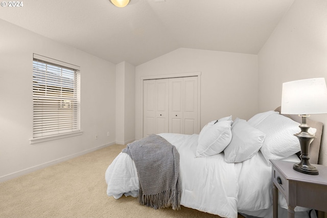 8844 NE Brentford Way, Hillsboro, OR 97006 - carpeted bedroom featuring a closet and vaulted ceiling