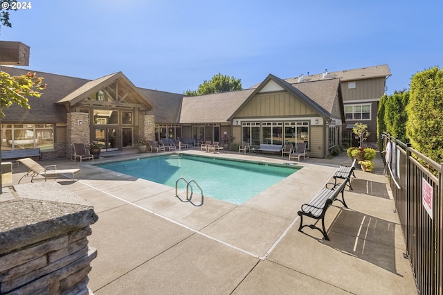 8844 NE Brentford Way, Hillsboro, OR 97006 - view of swimming pool featuring a patio