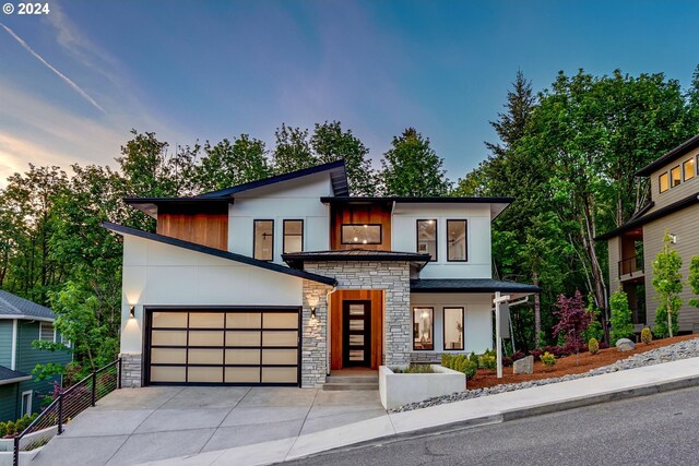 modern home featuring a garage