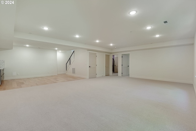 basement with light carpet