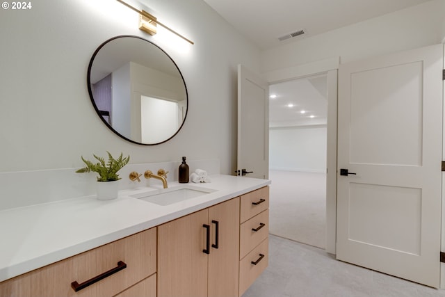 bathroom featuring vanity