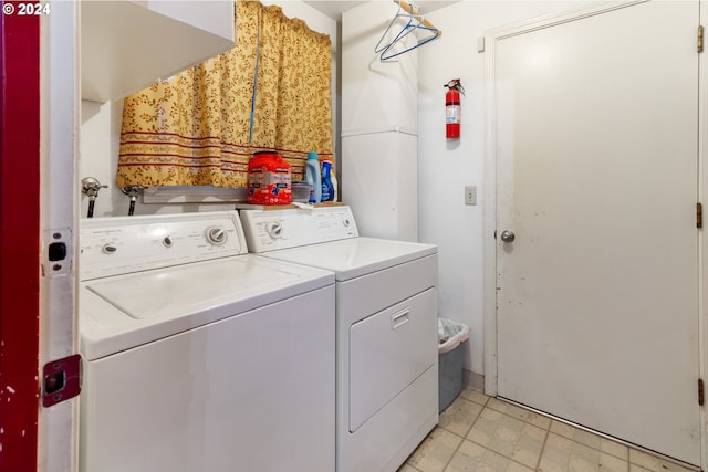 clothes washing area featuring washing machine and clothes dryer