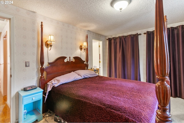 bedroom with a textured ceiling