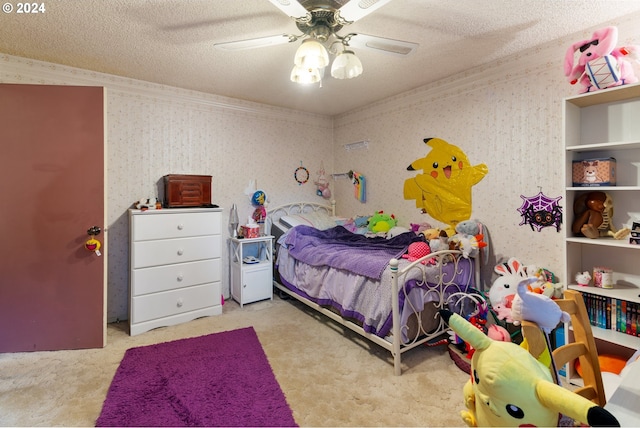 bedroom with light carpet, ceiling fan, and a textured ceiling