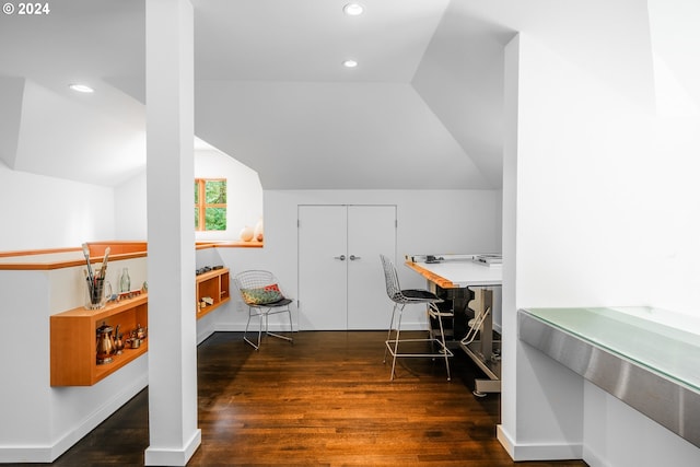 home office featuring lofted ceiling, wood finished floors, and recessed lighting