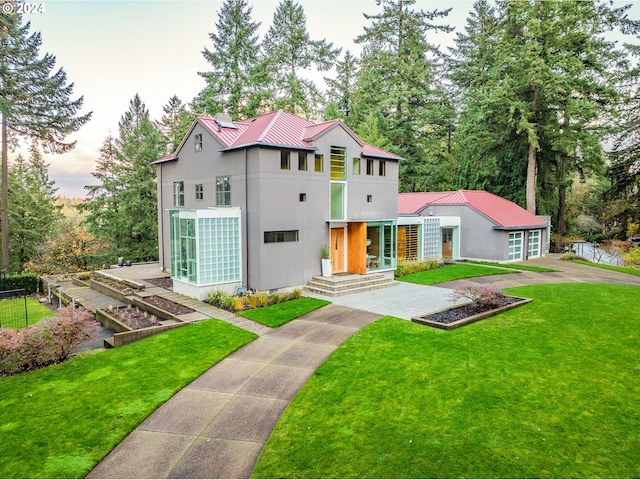 contemporary house featuring a yard