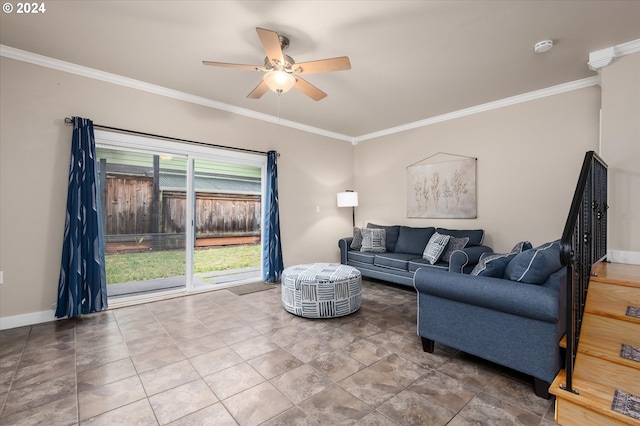 living room featuring ceiling fan and crown molding