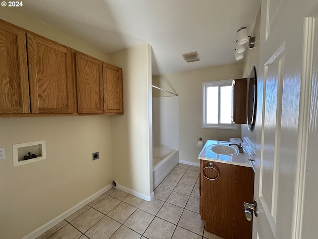 14865 Mt View Dr, Condon, OR 97823 - bathroom with shower / tub combination, tile patterned floors, vanity, and baseboards