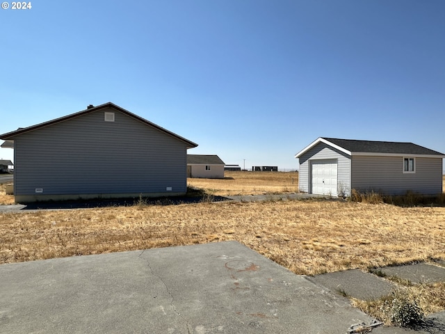 14865 Mt View Dr, Condon, OR 97823 - view of yard featuring an outbuilding and a detached garage