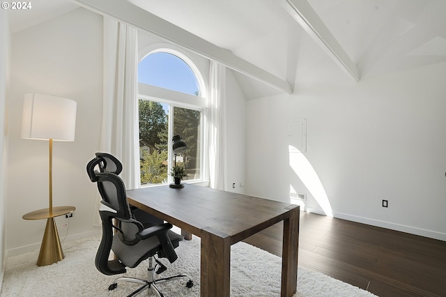 home office with lofted ceiling with beams and dark hardwood / wood-style flooring