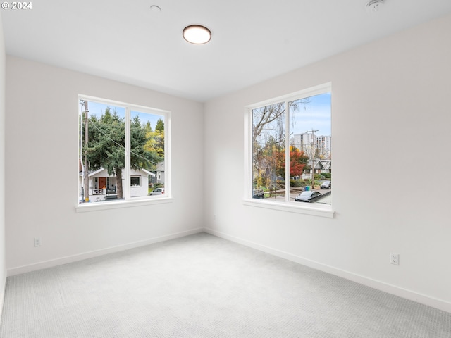 empty room featuring carpet floors