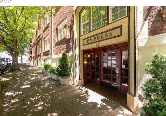 property entrance featuring french doors