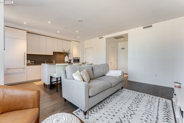 living room with hardwood / wood-style flooring