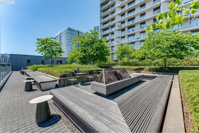 exterior space featuring an outdoor fire pit