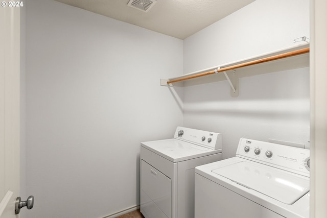 laundry area featuring washer and dryer