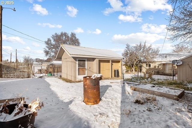 exterior space with an outbuilding