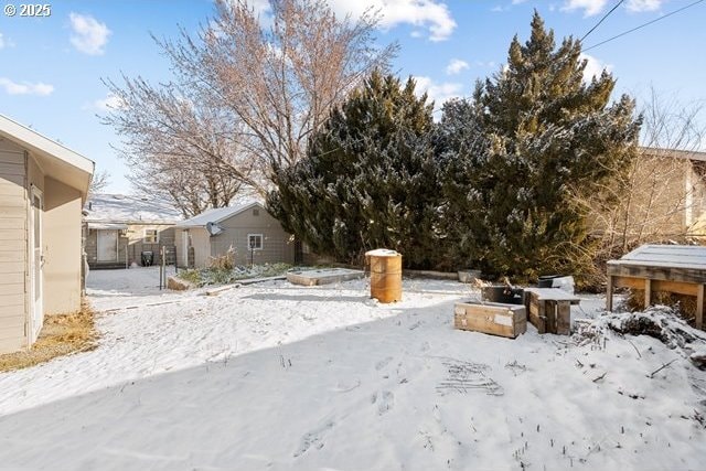 view of yard covered in snow