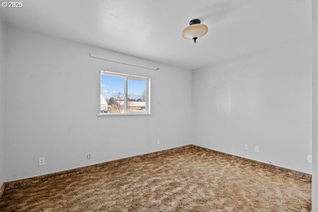 unfurnished room with carpet