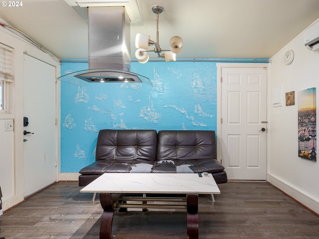 dining space featuring a wall unit AC and dark hardwood / wood-style flooring