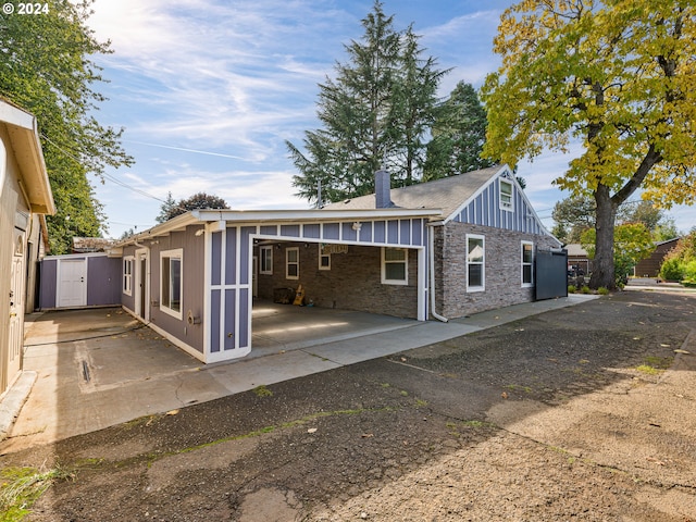 back of house featuring a patio area