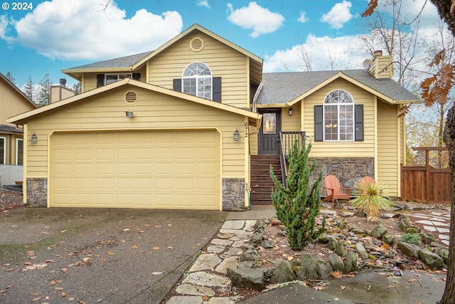 view of front of home with a garage