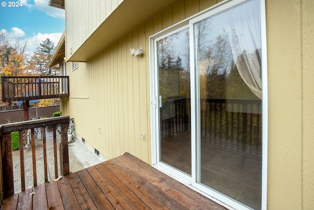 wooden balcony featuring a wooden deck