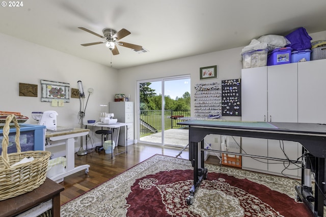 office area with ceiling fan and dark wood-type flooring