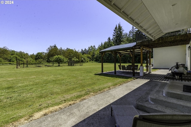 view of yard featuring a gazebo and a patio area