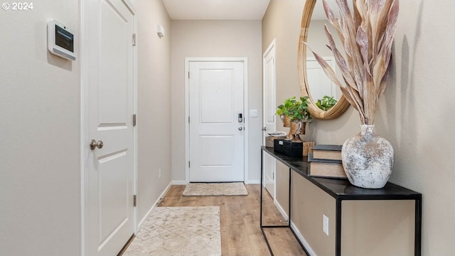 doorway featuring light hardwood / wood-style floors