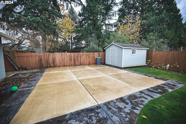 view of patio with a storage unit