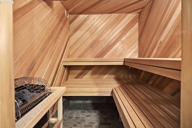 view of sauna / steam room with wooden walls