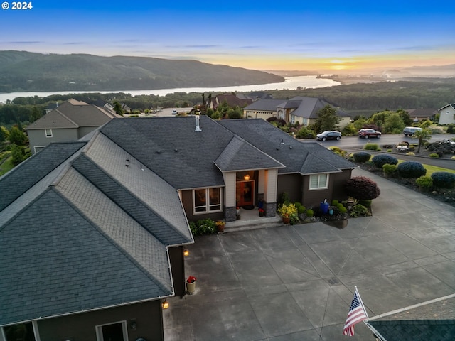 aerial view at dusk with a mountain view