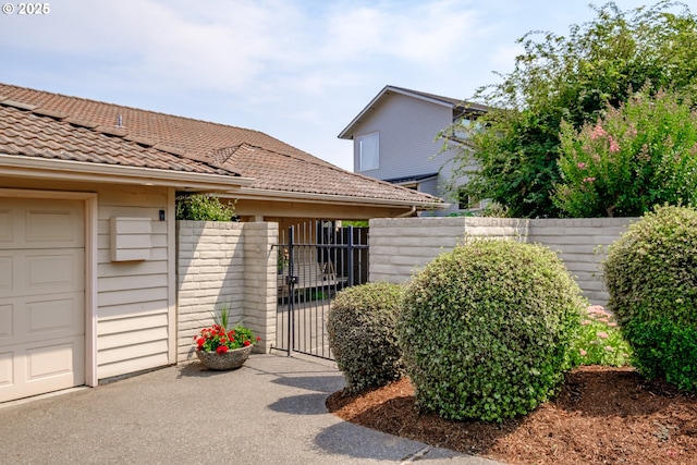 exterior space with a garage