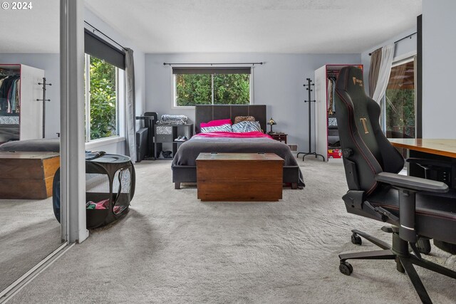 bedroom with light carpet