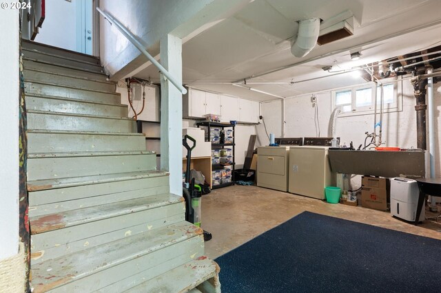 basement with separate washer and dryer