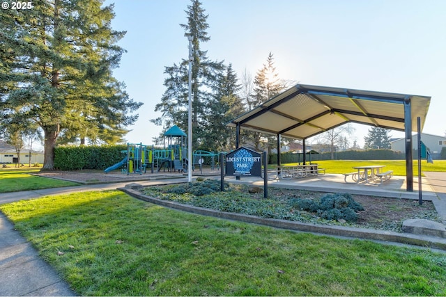 view of community with a lawn and a playground