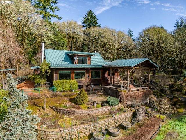 view of front of property featuring metal roof