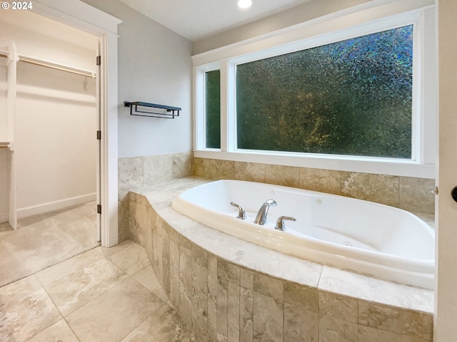 11574 SE Ross Rd, Happy Valley, OR 97086 - full bath featuring a spacious closet, a garden tub, and plenty of natural light