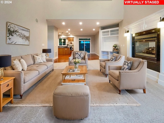 11574 SE Ross Rd, Happy Valley, OR 97086 - living room featuring recessed lighting, a high ceiling, and baseboards