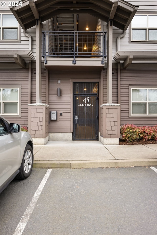 property entrance with a balcony