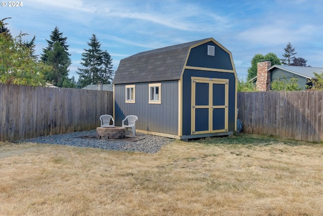 view of outdoor structure with a lawn