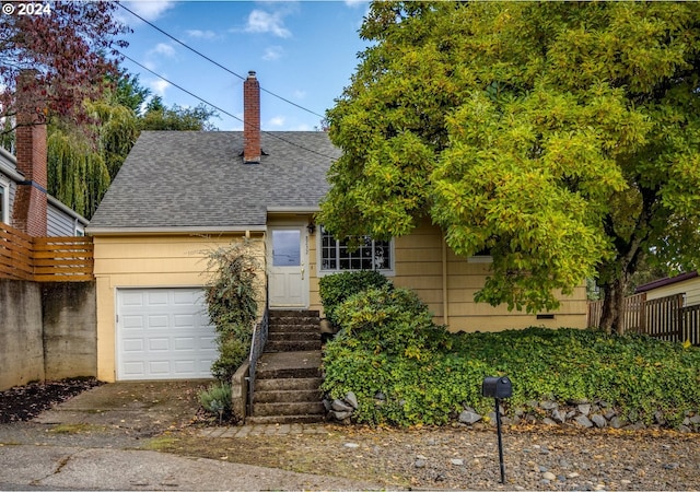 view of front of house with a garage