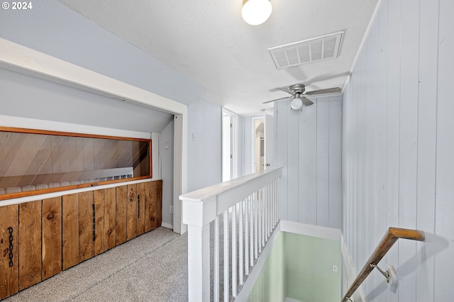 hallway with wooden walls