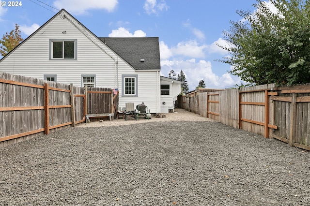 back of house featuring a patio area