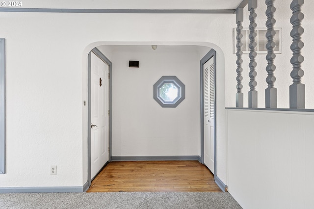 hallway featuring light hardwood / wood-style flooring