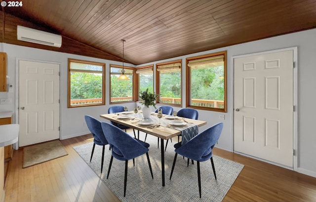 dining room with hardwood / wood-style flooring, vaulted ceiling, a wall mounted AC, and wood ceiling