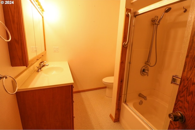 full bathroom with toilet, vanity, and  shower combination