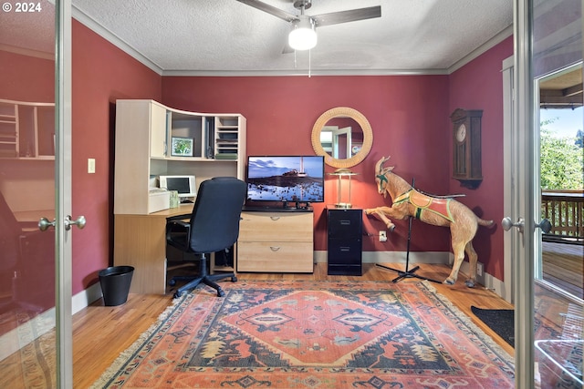 office space featuring a textured ceiling, french doors, and wood-type flooring