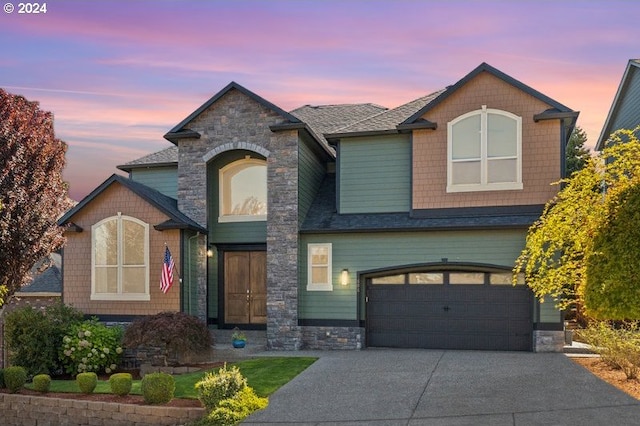 view of front of home with a garage